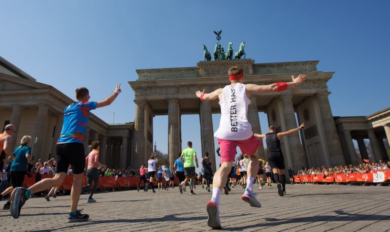 Photo of runners crossing the finish line at the Generali Berlin Half Marathon