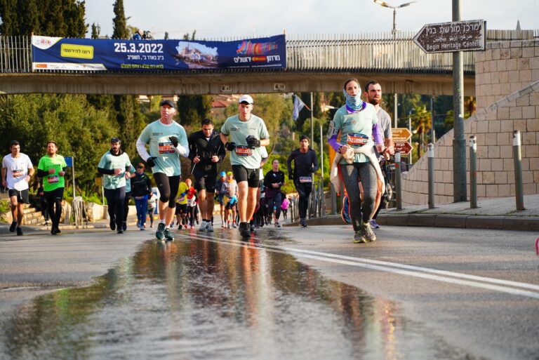 Runners negotiating a hill during the Jerusalem Marathon 2024