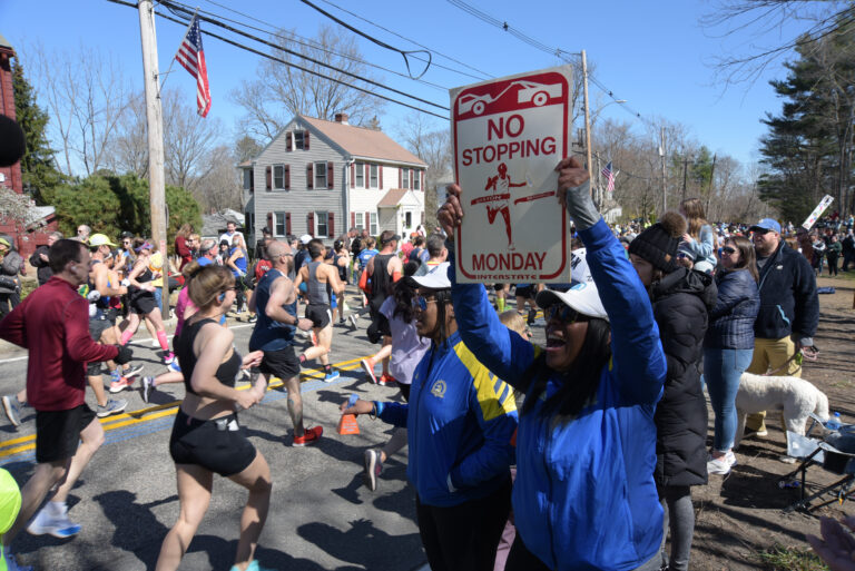 Photo of spectators encouraging runners during the Boston Marathon 2024
