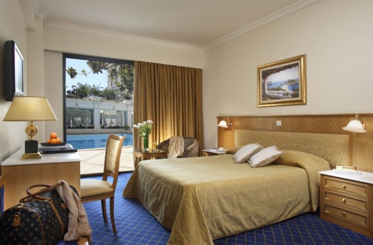 Bedrooms at the Royal Olympic Hotel, the hotel available for the Athens Marathon 2024 with Marathon Tours & Travel