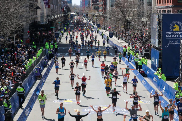 Photo of runners finishing the Boston Marathon 2024