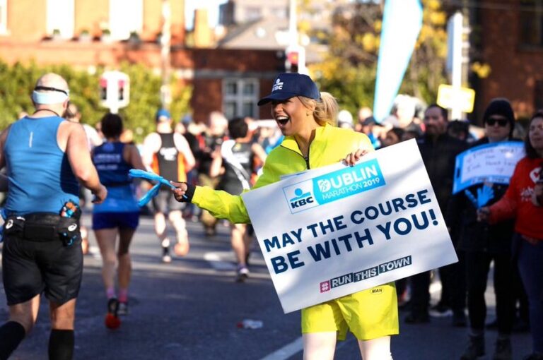 A supporter offers encouragement during the Dublin Marathon 2024