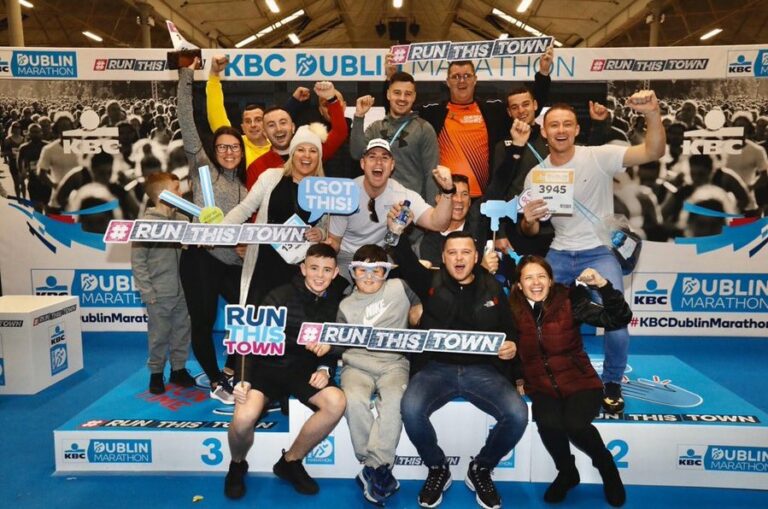 Runners celebrating having completed the Dublin Marathon 2024