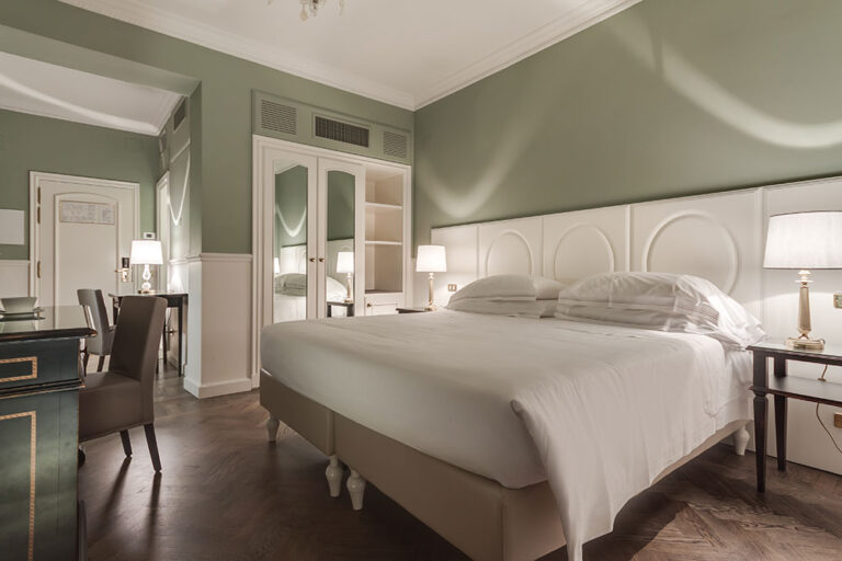 Bedroom at the Plaza Hotel Lucchesi, part of the Florence extension of our Rome Marathon 2027 package