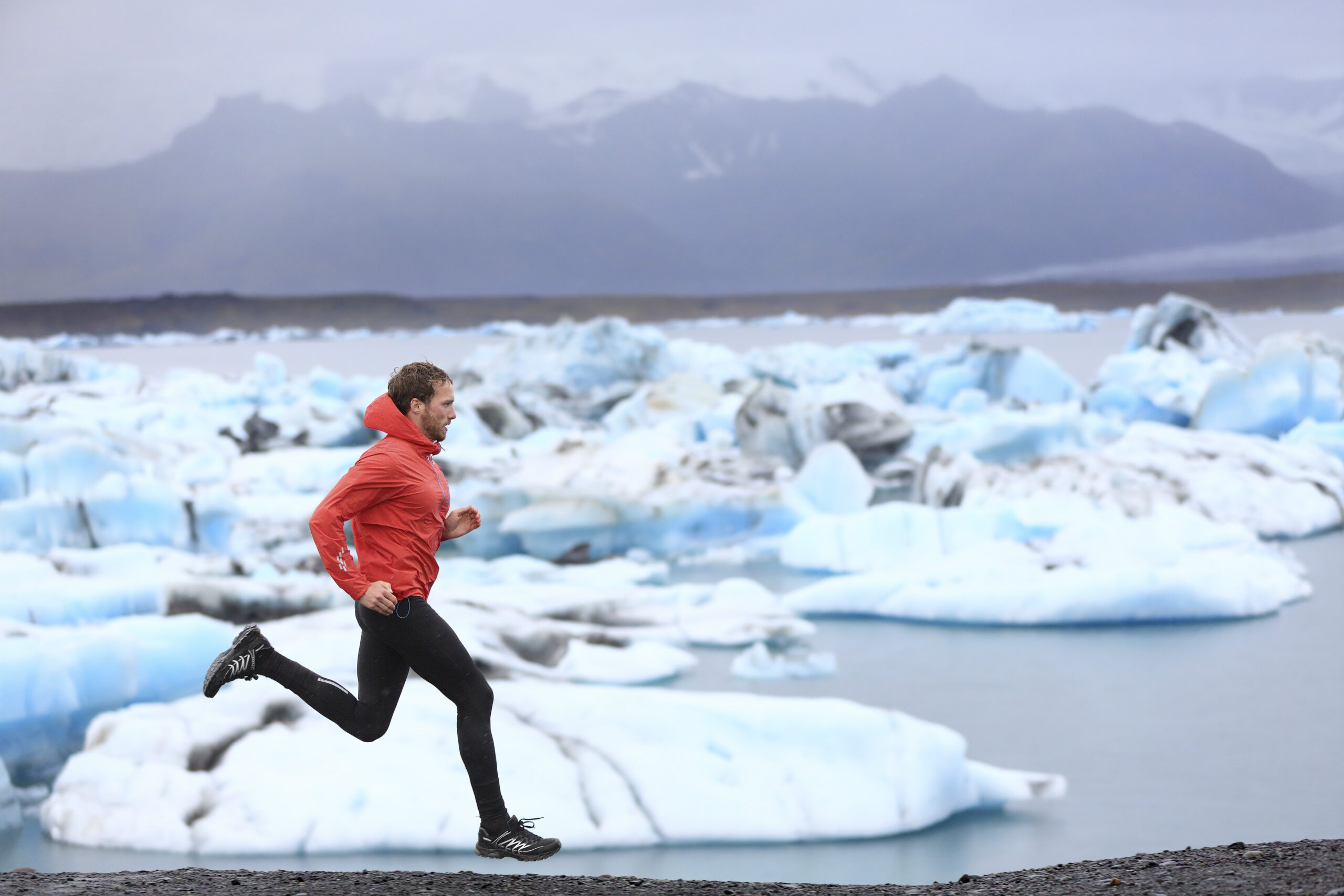 Photo of a runner taking part in the IceFjord Marathon 2024, one of the most spectacular marathons in the world