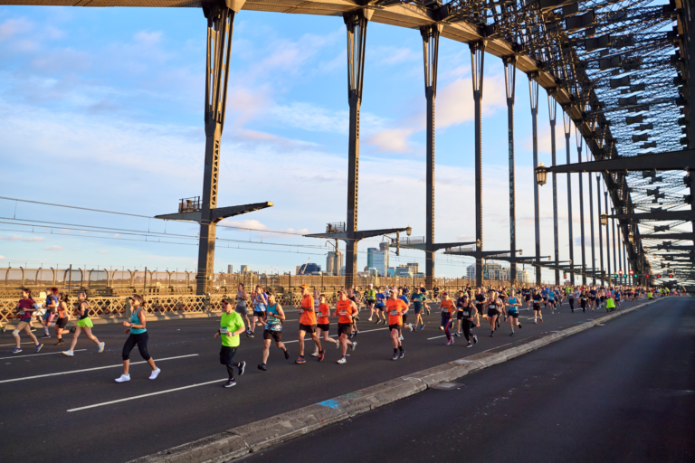 Runners passing over the Sydney Harbour Bridge during the Sydney Marathon 2024