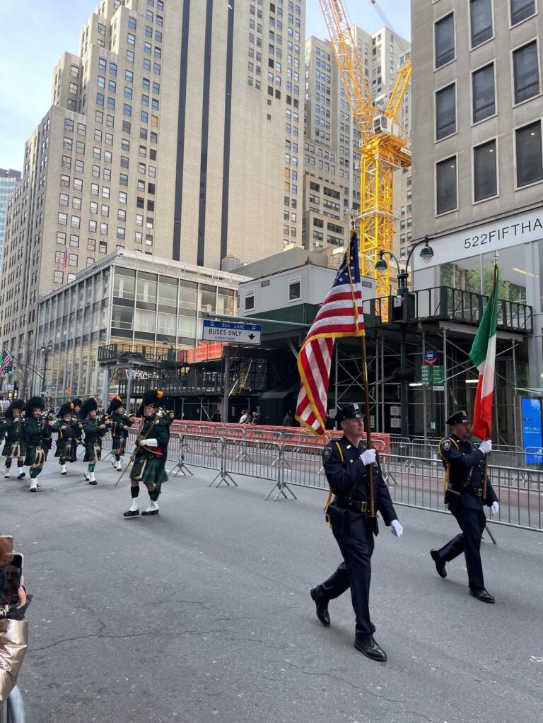 Photo of a parade taking place on the day of the New York Half Marathon