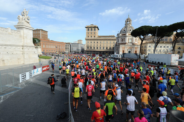 Photo of runners passing through Rome during the Rome Marathon