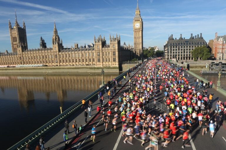 Runners passing over Westminster Bridge on the Royal Parks Half Marathon 2024 course