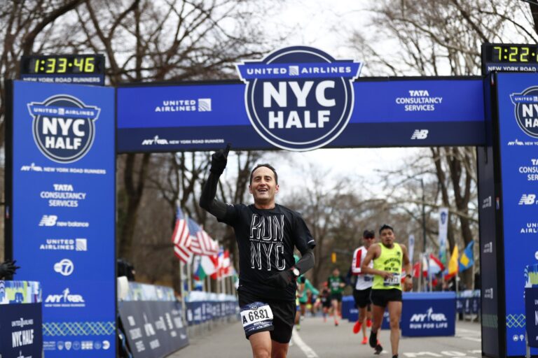 Photo of a runner completing the New York Half Marathon
