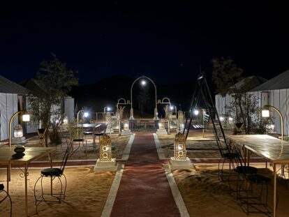 Dinner settings on the 4 Day Marrakech to Merzouga Desert Tour, with Camel Ride and Desert Camp Stay, extension option on the Marrakech Marathon 2025 package