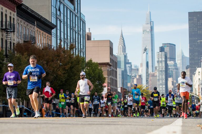 Runners heading away from the New York skyline during the New York City Marathon 2024