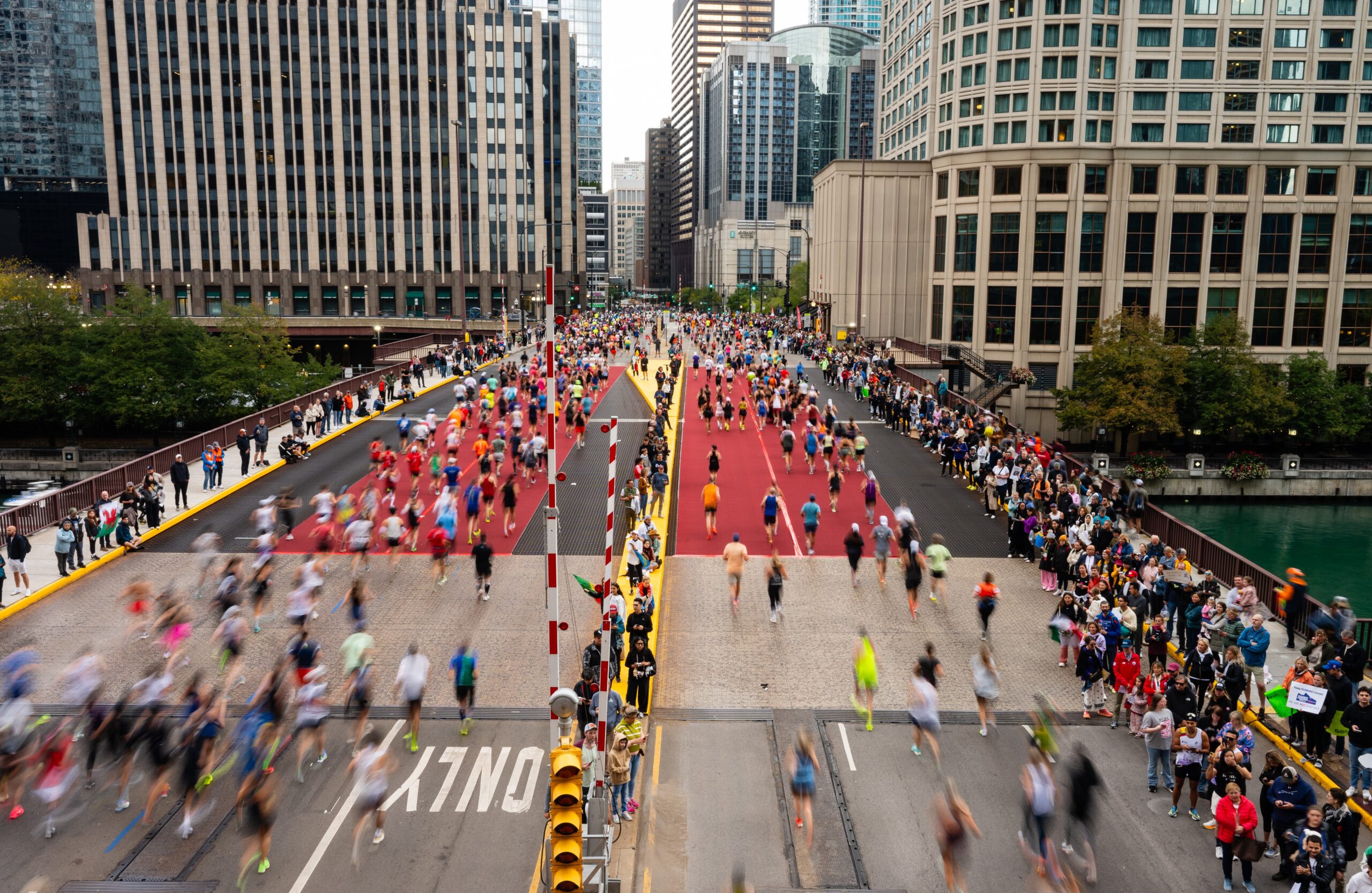 Runners pass through downtown Chicago during the Chicago Marathon 2025