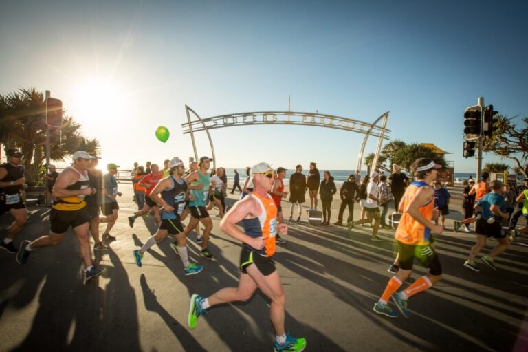 Photo of the sun shining down on runners at the Gold Coast Marathon 2024