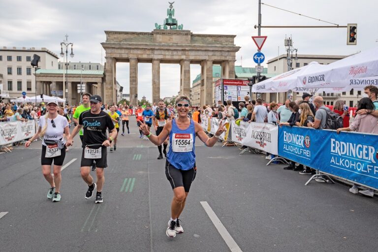 Runners approaching the finish line of the Berlin Half Marathon, part of the SuperHalfs series