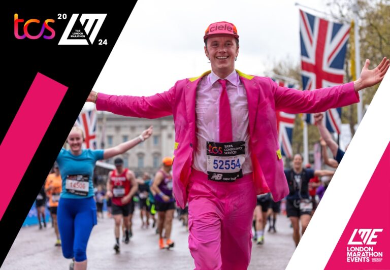 A runner in fancy dress crosses the finish line during the London Marathon 2025