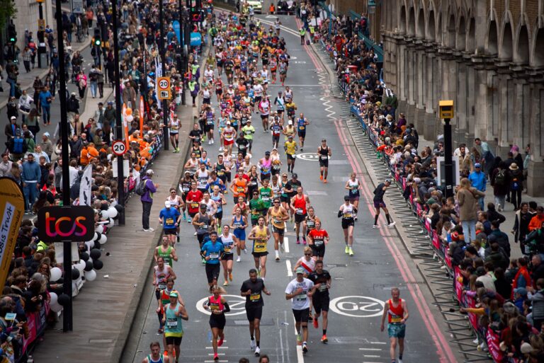 Runners passing through London during the London Marathon 2025