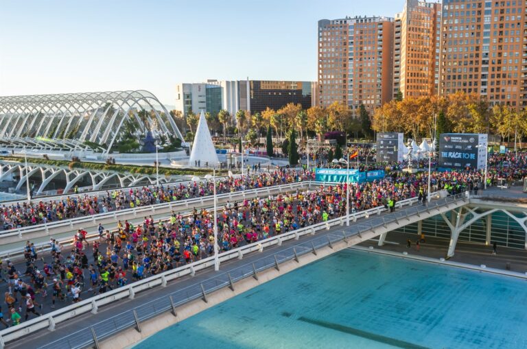 Runners crossing a bridge during the Valencia Marathon 2024