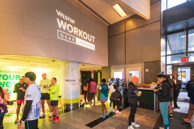 Runners chat at the Westin Times Square, hotel for the New York City Marathon 2025 Abbott Age Group World Championships