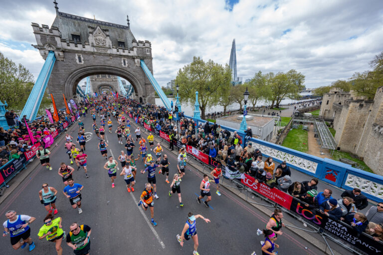 Runners cross Tower Bridge, part of the 2025 London Marathon course