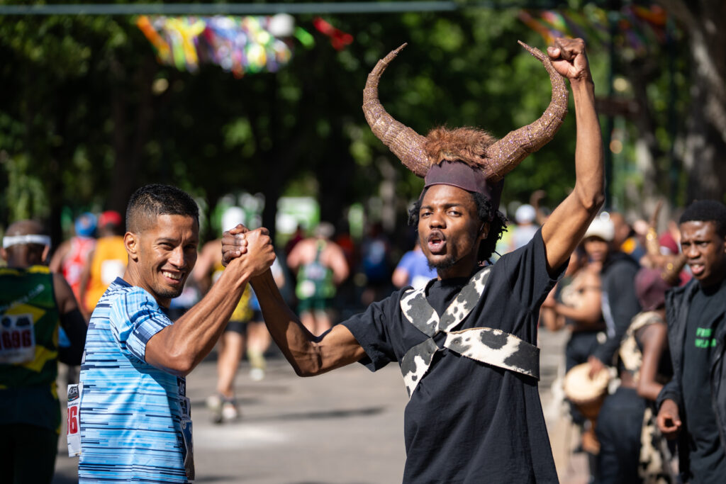 A runner celebrates having completed the Cape Town Marathon 2026