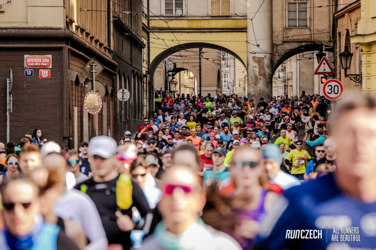 Runners flood the historic streets of Prague during the Prague Half Marathon