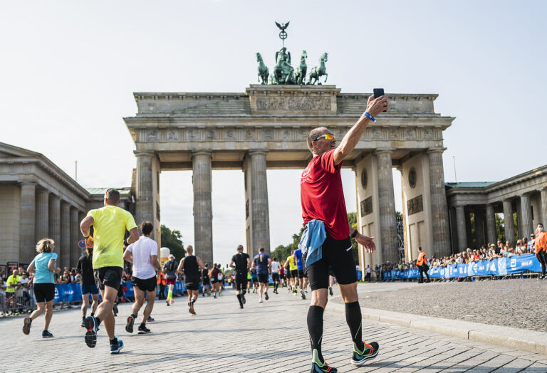 Runner taking selfie at the Abbott World Marathon Major event, the BMW Berlin Marathon.