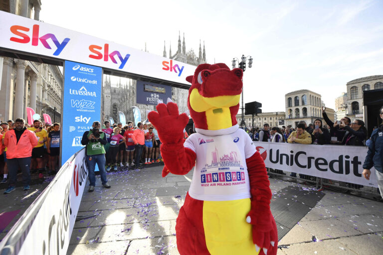 The official race mascot at the start of the Milan Marathon