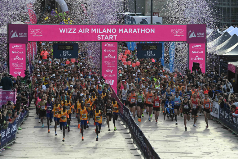 Runners start on their Milan Marathon journey