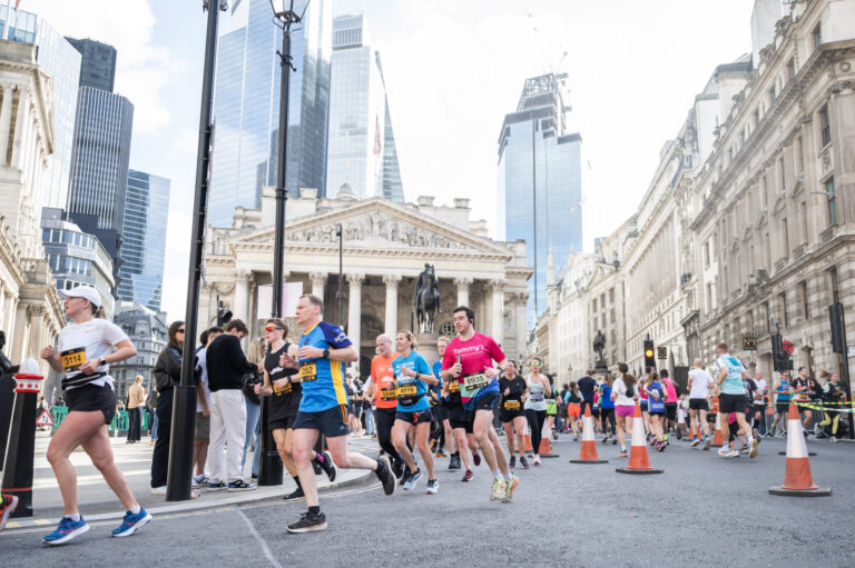 Runners pass through the City of London during the London Landmarks Half Marathon 2025