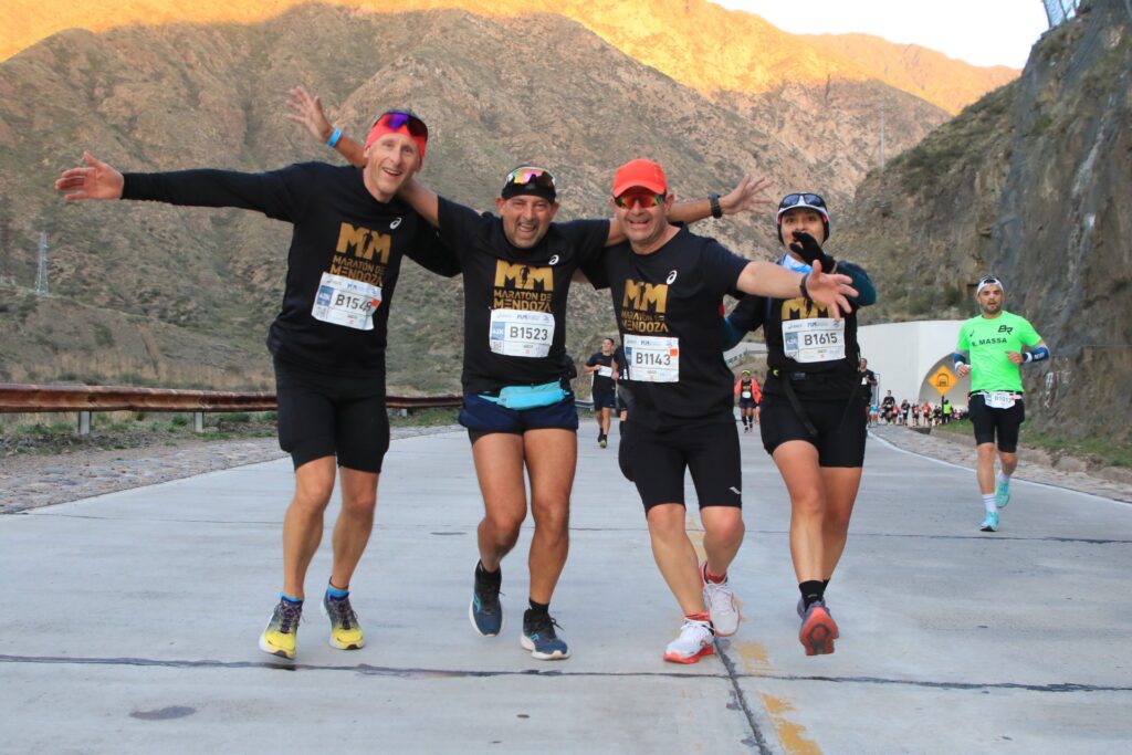 Runners pose mid-race of the Mendoza Marathon