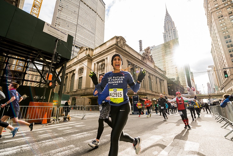 A Seven Continents Club member poses to camera during a marathon