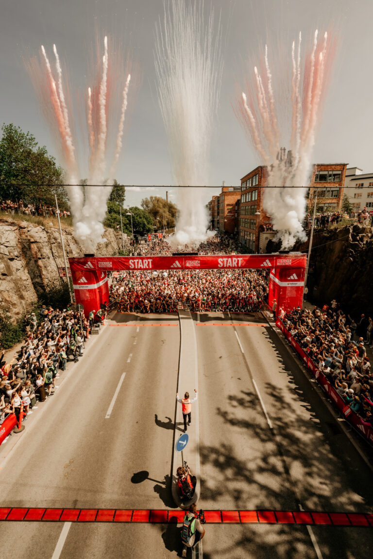 Fireworks go off at the start of the Stockholm Marathon