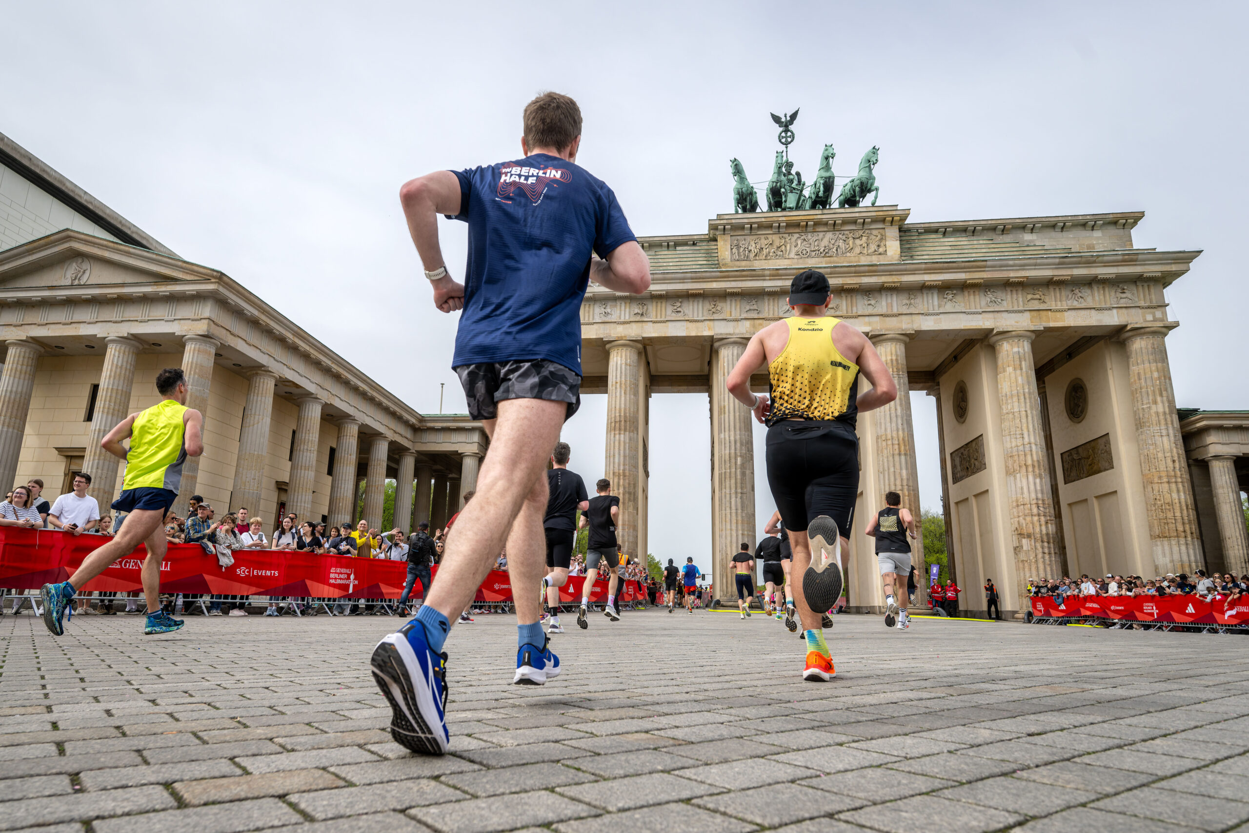 Runners approaching the finish line of the GENERALI BERLIN Half Marathon, which is part of the SuperHalfs series