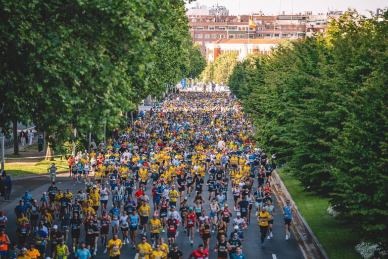 Runners passing through Madrid parkland during the Madrid Marathon 2027