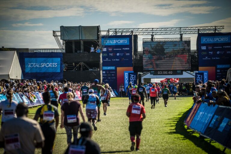 Runners approaching the finish line during the Two Oceans Ultra Marathon