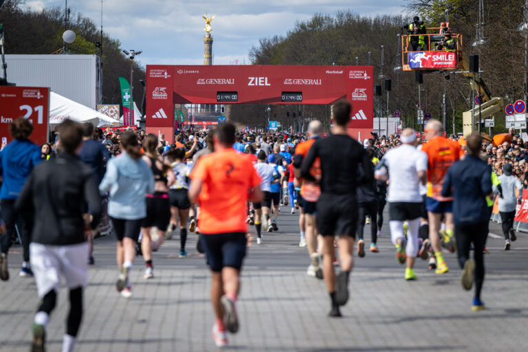 Runners approaching the finish line of the Berlin Half Marathon