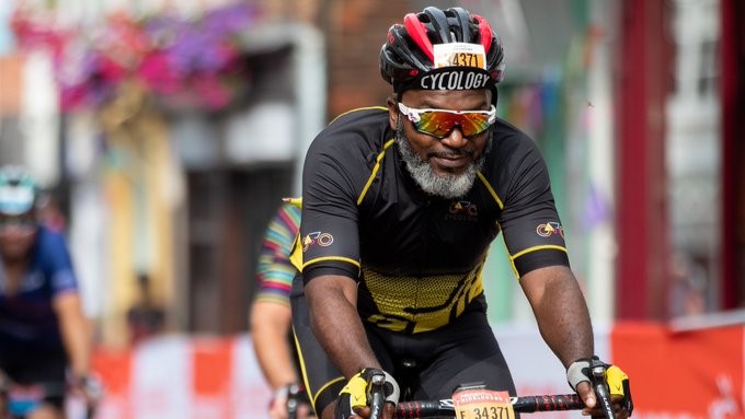 Photo of a cyclist, aiming to promote runners to take part in different sports so as not to succumb to National Quitters Day
