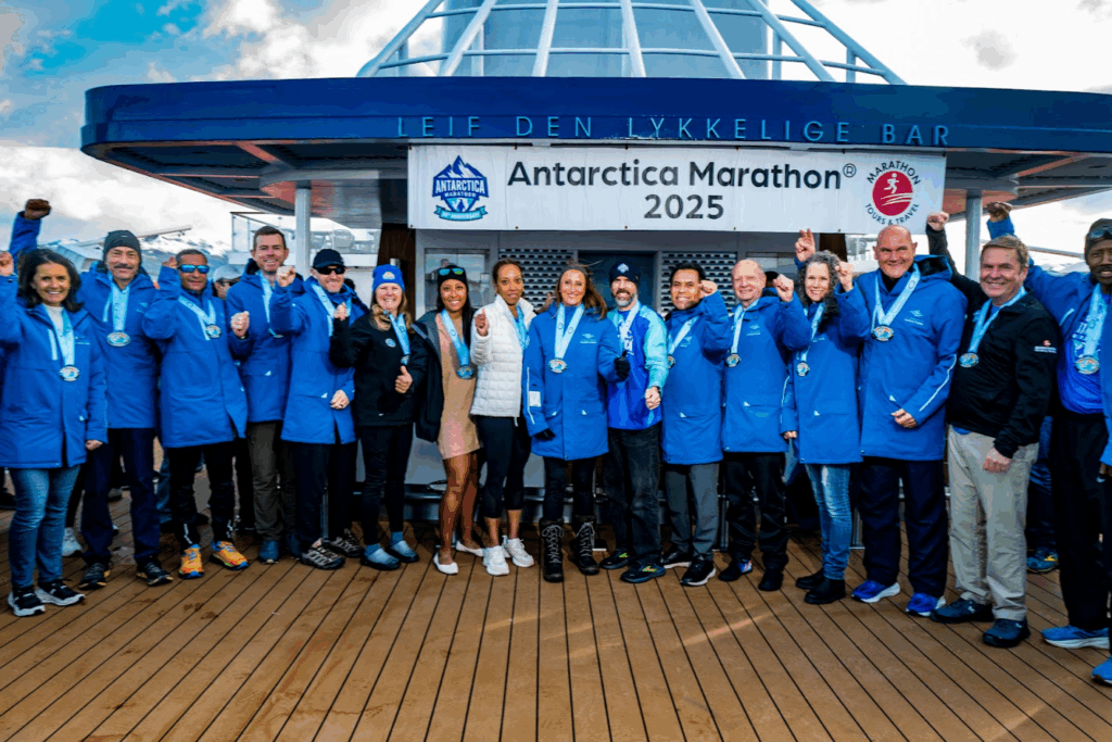 Runners pose on the Antarctica Marathon ship
