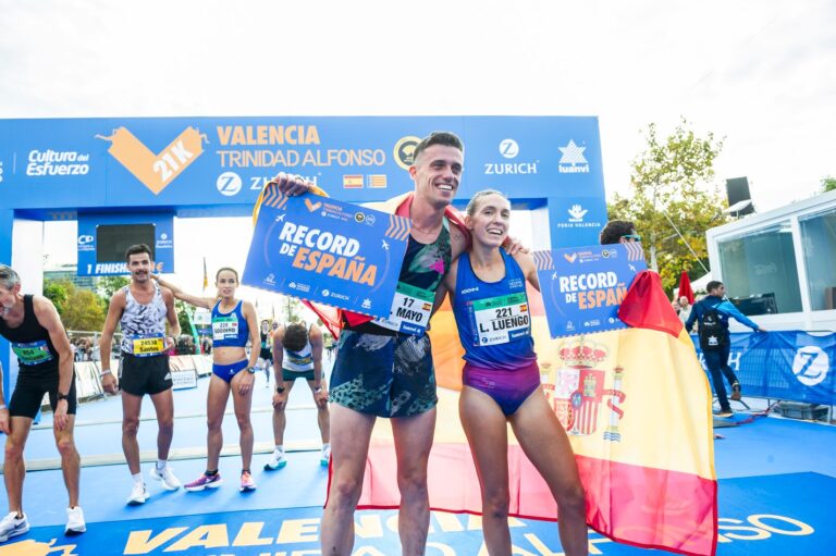 Runners pose having completed the Valencia Half Marathon
